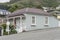 Traditional house on uphill street at Lyttleton, Cristchurch, New Zealand