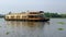 Traditional houseboat at beautiful backwaters in Alleppey, Kerala, India