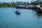 Traditional Houseboat seen sailing through the picturesque backwaters of Allapuzza or Alleppey in Kerala /India