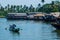 Traditional Houseboat seen sailing through the picturesque backwaters of Allapuzza or Alleppey in Kerala /India