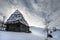 Traditional houses in Dumesti village, Apuseni Mountains, Romania, in winter