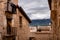 Traditional houses made of stone in a rural village, mountain ranges Els Ports at the background, Valderrobres, Teruel, Aragon,