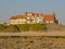 Traditional houses on the north sea of Audresselles, France, in warmr evning sunlight