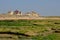 Traditional houses on the of the north sea coast in Audresselles, France, with beach and rock coast in front