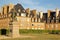 Traditional houses viewed from the ramparts, with the statue of Jacques Cartier a French navigator born in Saint Malo in 1491. T