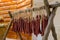 Traditional Hunting Sausages on the table. Family gathering for food preservation, pork meat and venison from a local