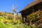 Traditional hut and Klapotetz windmill on vineyard on Schilcher