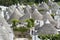 Traditional huts with a conical roof in Italy