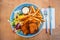 Traditional Icelandic grilled fish and chips, and salad, summer