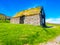 Traditional icelandic house with turf on the roof