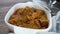 Traditional Indian curry lamb masala in a bowl on table