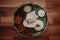 Traditional indian steel plate thali on banana leaves with various sauces