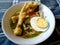traditional indonesian culinary food. Soto Ceker Ayam Kuah Kuning or Soto chicken feet