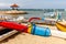 Traditional Indonesian outrigger style wooden fishing boat jukung on the beach at Sanur, Bali, Indonesia.