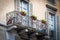 Traditional Italian balcony with flower pots in Bergamo town, Italy