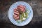 Traditional Italian barbecue dry aged fillet steak with vegetable slices on a plate