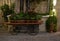 Traditional Italian flowers cart at romantic restaurant.