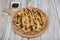Traditional Italian food: Healthy Homemade Quinoa Crust Cheese Pizza with Basil, with pesto sauce