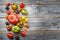 Traditional Italian fresh tomato collection on a rustic wooden board