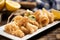 Traditional Italian fried calamari and lemon slice