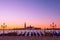 Traditional Italian gondolas moored to the poles in Europe Venice