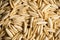 Traditional Italian pasta cavatelli on the kitchen wooden table. Selective focus. Shallow depth of field