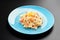 Traditional Italian pasta dish, spaghetti carbonara yolk, parmesan cheese, bacon plate black background menu