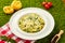 Traditional italian Pasta tagliatelli with spinach, hard parmesan cheese and cream sauce