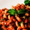 Traditional italian pasta with tomato sauce and basil on the top. Homemade Marinara sauce with Cavatappi pasta. Closeup