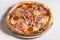 Traditional Italian pizza with ham