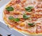 Traditional Italian pizza with prosciutto ham