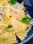 Traditional Italian ravioli stuffed with potatoes and cheese in a creamy Carbonara sauce