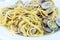 Traditional Italian seafood, spaghetti vongole made with seashells and linguini pasta
