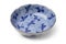 Traditional Japanese blue and white bowl decorated with cranes on white background