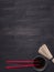 Traditional Japanese buckwheat soba noodles with soy sauce and red chopsticks on wooden rustic background top view close up border