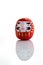 Traditional japanese Daruma doll symbol of fortune and luck isolated in white background