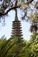 Traditional Japanese garden. Stone-level tower.