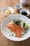 Traditional Japanese hokkaidon thinly sliced salmon donburi in a bowl