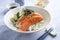Traditional Japanese Hokkaidon  Thinly sliced salmon Donburi  in a bowl