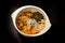 Traditional Japanese miso soup with seaweed and fish. Close-up  top view. Concept - Japanese cuisine  food delivery