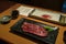 traditional japanese restaurant, with wagyu steak and raw fish on the menu