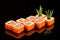 Traditional japanese sushi roll with salmon and red caviar, close up isolated on a black background