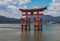 Traditional Japanese Torii gate in front of the Itsukushima Shrine at Miyajima, Japan during low tide