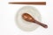 Traditional Japanese wooden chopstick and wooden spoon on white