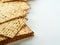 Traditional Jewish bread - matzah. White simple background. High angle view. Celebration of Jewish Passover, kosher dish, religion