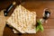 Traditional Jewish kosher matzo for Easter pesah on a wooden tab