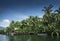 Traditional jungle boat at pier on tatai river in cambodia