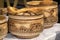 Traditional Kazakh wooden tableware with national ornament is sold on the market