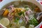 Traditional Khmer soup with vegetables and meat. Cambodia native cuisine. Vegetable soup with beef closeup photo