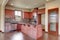 Traditional kitchen with dark hardwood floor.